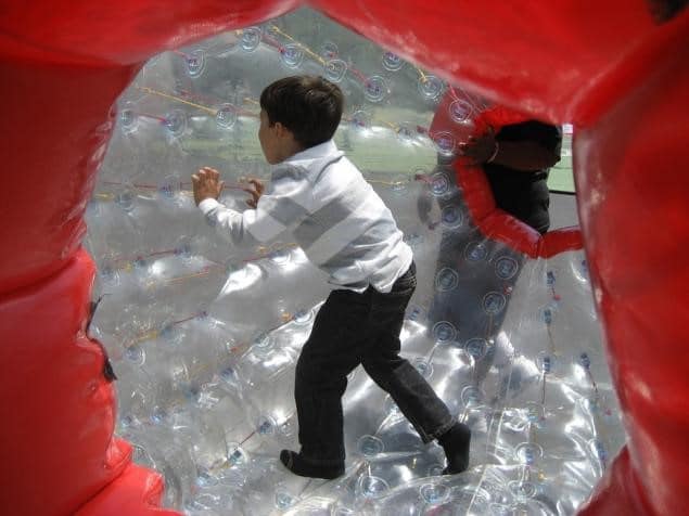 Kids in Bouncy Castle Tube